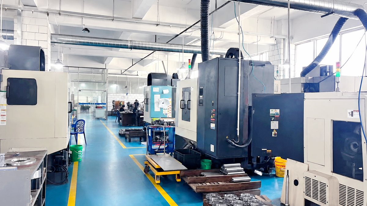 Organised Andevet production floor with CNC machines and parts in progress